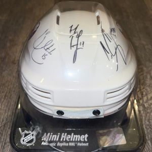 NY ISLANDERS AUTOGRAPHED MINI HELMET Cal Clutterbuck Matt Martin Casey Cizikas